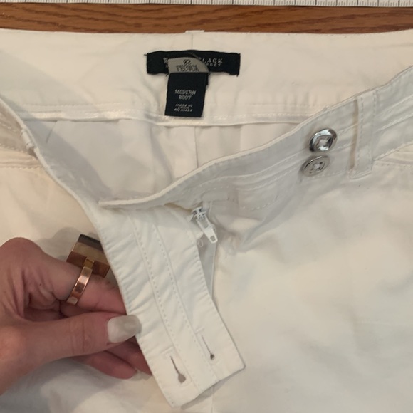 Modern boot cut, white, wide-leg pants. - Picture 7 of 12